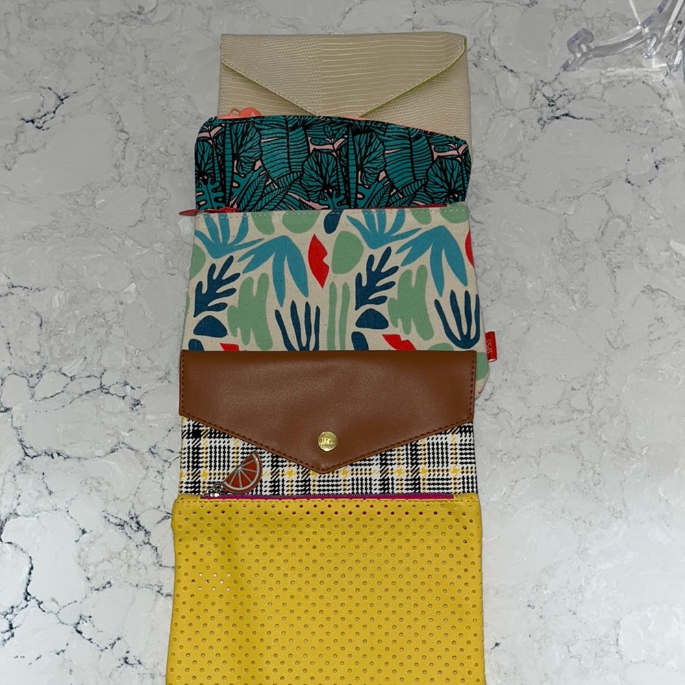 Ipsy set of five “exotic travel vibes” makeup bags